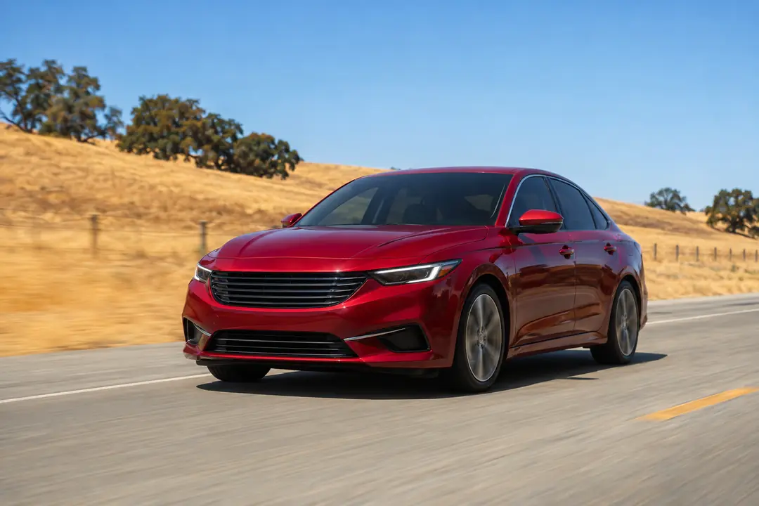 A sedan on a Central Valley road in summer
